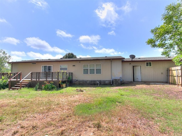 12325 Spring Meadows Rd, Yukon, OK 73099 - back of house with a deck and central AC unit