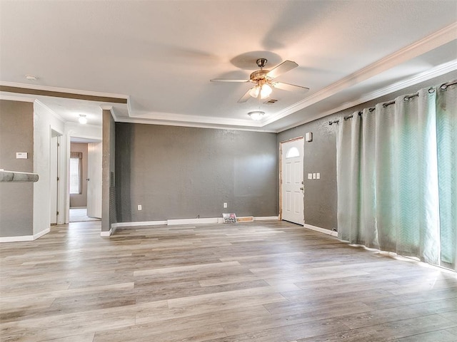 12325 Spring Meadows Rd, Yukon, OK 73099 - spare room with crown molding, ceiling fan, light wood-style flooring, baseboards, and a smoke detector