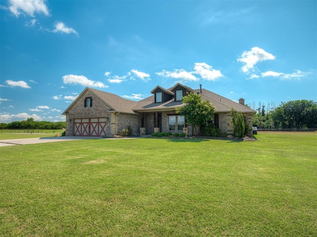 5021 SE 12th Ave, Washington, OK 73093 - view of front of property with driveway, a front yard, and brick siding