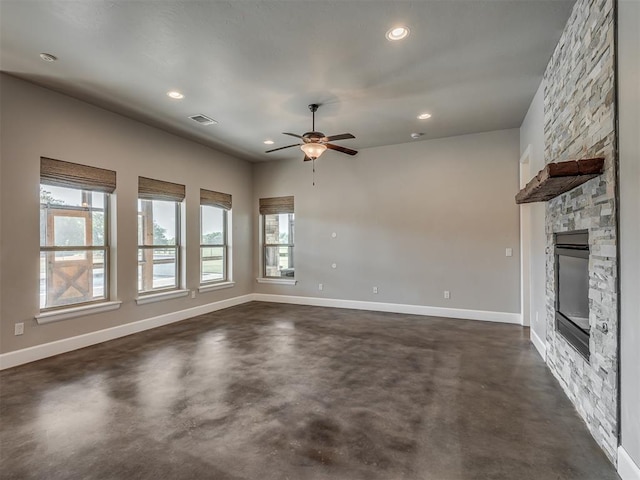 5021 SE 12th Ave, Washington, OK 73093 - unfurnished living room with concrete floors, ceiling fan, a fireplace, and recessed lighting