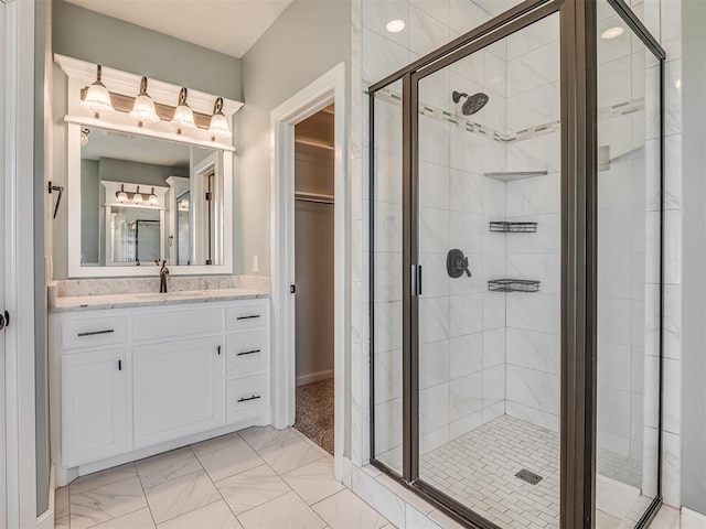 5021 SE 12th Ave, Washington, OK 73093 - full bath with a shower stall, vanity, a spacious closet, and marble look tile flooring