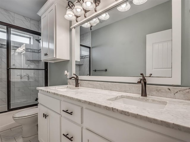 5021 SE 12th Ave, Washington, OK 73093 - full bath featuring double vanity, shower / bath combination with glass door, and marble look tiles