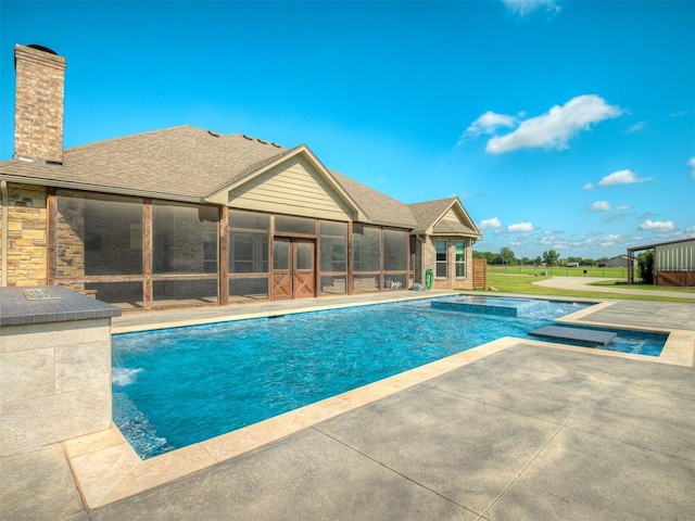 5021 SE 12th Ave, Washington, OK 73093 - outdoor pool with a sunroom, a patio, and a yard