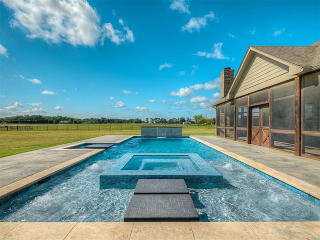 5021 SE 12th Ave, Washington, OK 73093 - view of swimming pool featuring a sunroom, a lawn, and a pool with connected hot tub