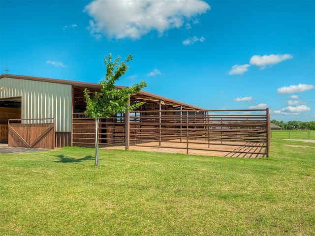 5021 SE 12th Ave, Washington, OK 73093 - view of yard featuring an exterior structure, an outbuilding, and a garage