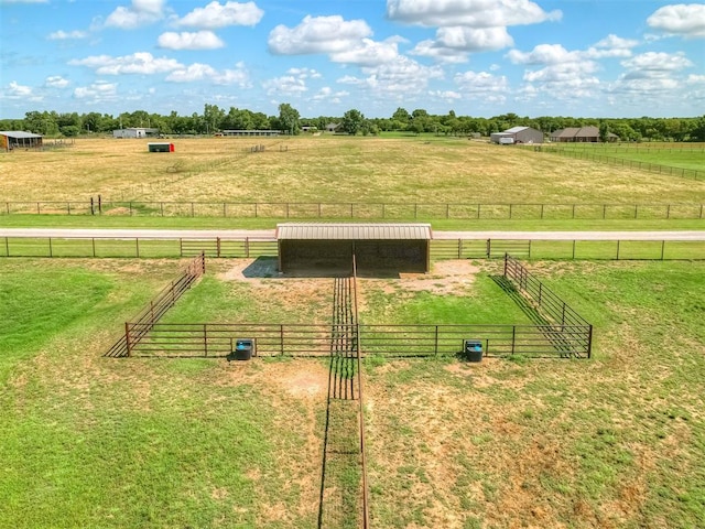 5021 SE 12th Ave, Washington, OK 73093 - view of yard featuring a rural view, an exterior structure, and an outbuilding
