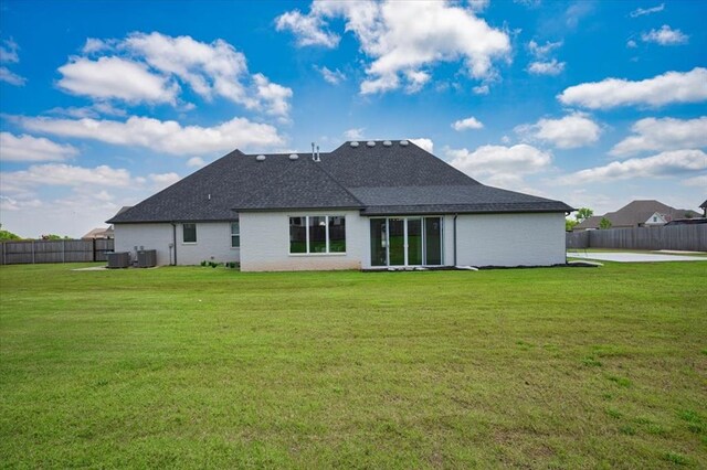 1049 Dorsi Way, Newcastle, OK 73065 - rear view of property with central air condition unit and roof with shingles