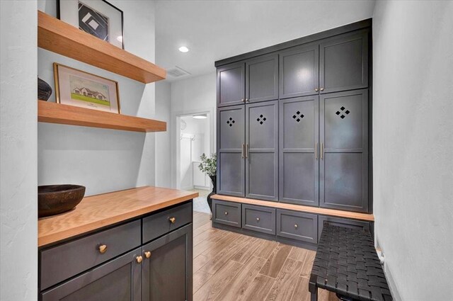 1049 Dorsi Way, Newcastle, OK 73065 - mudroom featuring light wood-style flooring and recessed lighting
