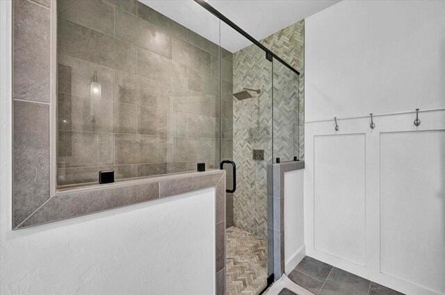 1049 Dorsi Way, Newcastle, OK 73065 - full bath with a stall shower, tile patterned flooring, and tile walls