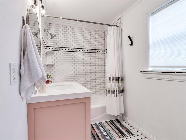 2647 NW 24th St, Oklahoma City, OK 73107 - full bath with shower / bath combo with shower curtain, vanity, plenty of natural light, baseboards, and crown molding