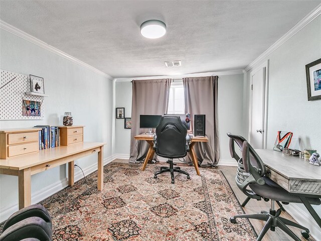 2647 NW 24th St, Oklahoma City, OK 73107 - home office with ornamental molding, baseboards, and a textured ceiling