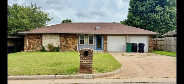 8228 NW 90th Ter, Oklahoma City, OK 73132 - view of front of house featuring concrete driveway, stone siding, and a garage