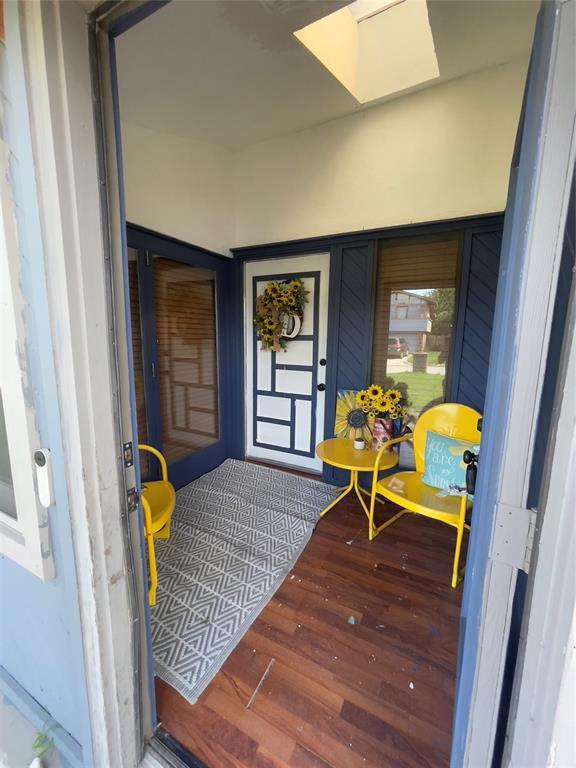 8228 NW 90th Ter, Oklahoma City, OK 73132 - doorway to property with covered porch
