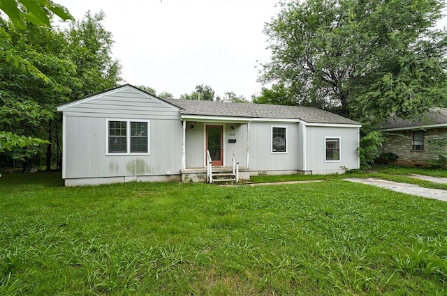 4110 SE 11th St, Oklahoma City, OK 73115 - ranch-style home featuring a front lawn