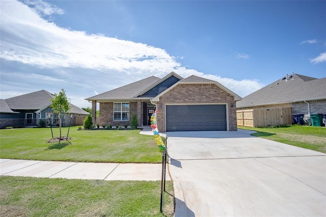 14128 Hamlet Way, Piedmont, OK 73078 - view of front facade featuring brick siding, a garage, and driveway