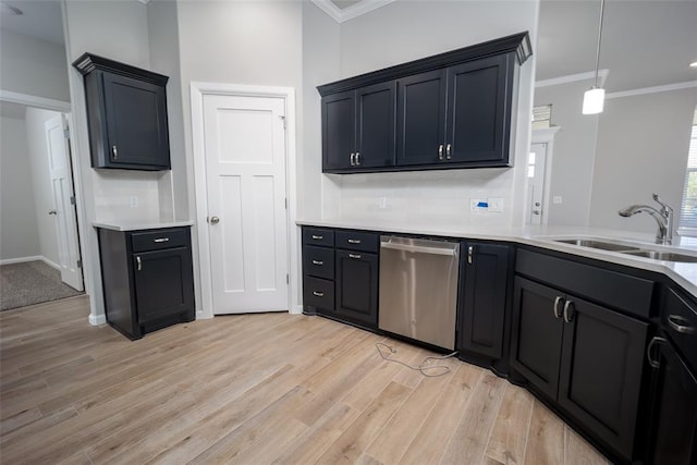 14128 Hamlet Way, Piedmont, OK 73078 - kitchen featuring stainless steel dishwasher, a sink, crown molding, light wood finished floors, and light countertops