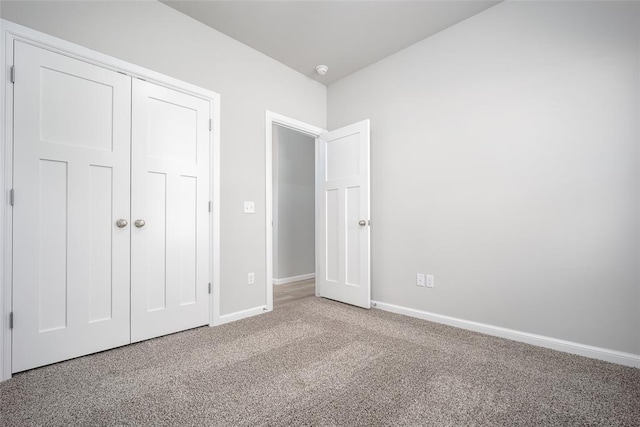 14128 Hamlet Way, Piedmont, OK 73078 - unfurnished bedroom featuring carpet, baseboards, and a closet