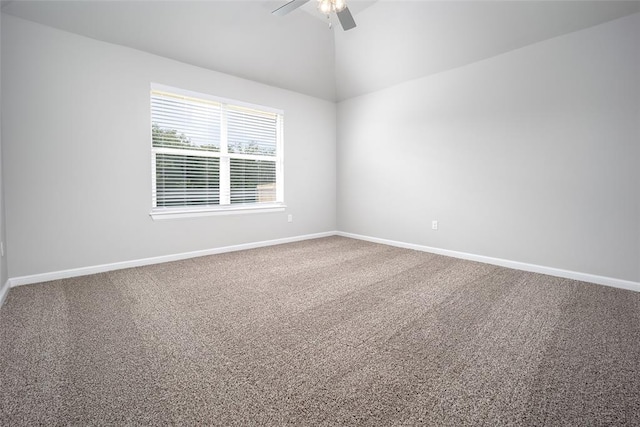 14128 Hamlet Way, Piedmont, OK 73078 - empty room with lofted ceiling, a ceiling fan, carpet floors, and baseboards