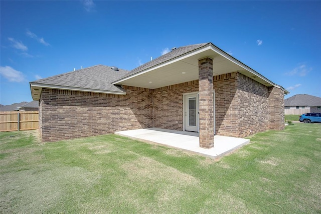 14128 Hamlet Way, Piedmont, OK 73078 - rear view of property with a patio area, brick siding, and roof with shingles