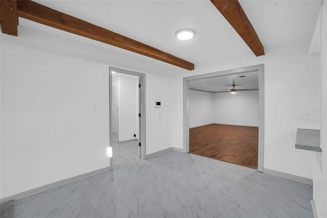 1048 Elk St, Altus, OK 73521 - basement featuring baseboards and ceiling fan