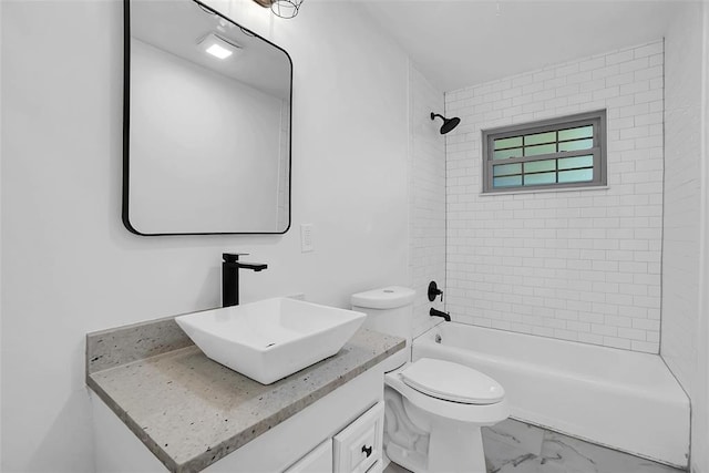 1048 Elk St, Altus, OK 73521 - full bath featuring vanity, marble finish floors, bathing tub / shower combination, and toilet