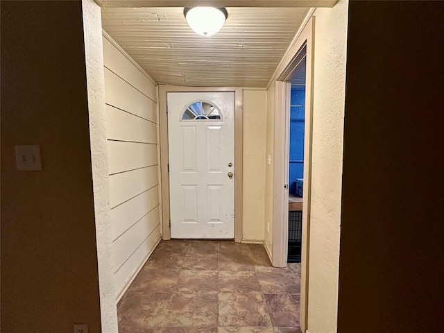 20973 US Highway 62, Altus, OK 73521 - doorway featuring a textured wall and wood ceiling