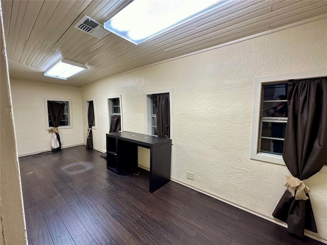 20973 US Highway 62, Altus, OK 73521 - unfurnished office with a textured wall and dark wood-type flooring
