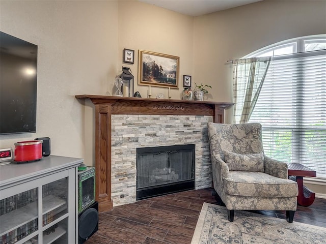 1816 Concord Pl, Norman, OK 73071 - sitting room with a stone fireplace and wood finished floors