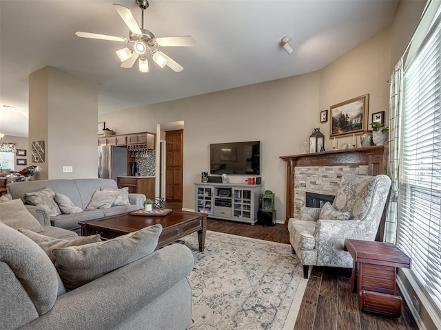 1816 Concord Pl, Norman, OK 73071 - living area featuring plenty of natural light, dark wood finished floors, ceiling fan, and a fireplace