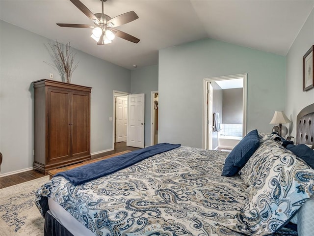 1816 Concord Pl, Norman, OK 73071 - bedroom with dark wood-type flooring, lofted ceiling, ensuite bathroom, and a ceiling fan