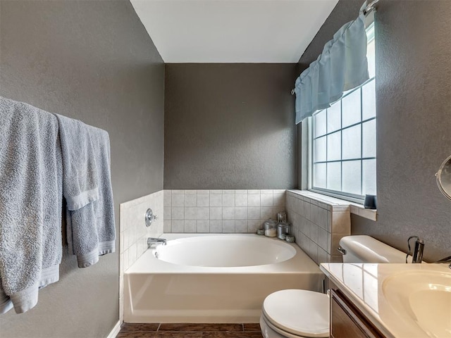 1816 Concord Pl, Norman, OK 73071 - full bath with a textured wall, a garden tub, toilet, and vanity