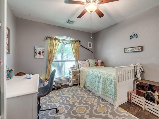 1816 Concord Pl, Norman, OK 73071 - bedroom with ceiling fan, baseboards, and wood finished floors