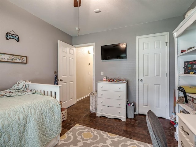 1816 Concord Pl, Norman, OK 73071 - bedroom with wood finished floors, ceiling fan, and baseboards