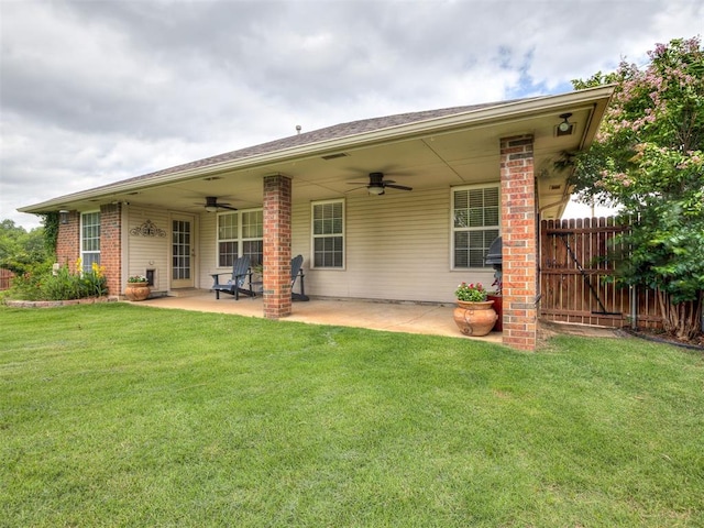 1816 Concord Pl, Norman, OK 73071 - rear view of property featuring a ceiling fan, a patio, and brick siding