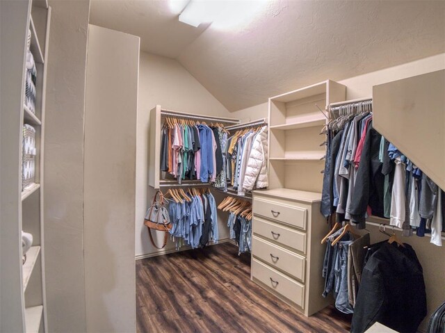 866 County St Unit 2922, Tuttle, OK 73089 - walk in closet featuring dark wood finished floors and vaulted ceiling
