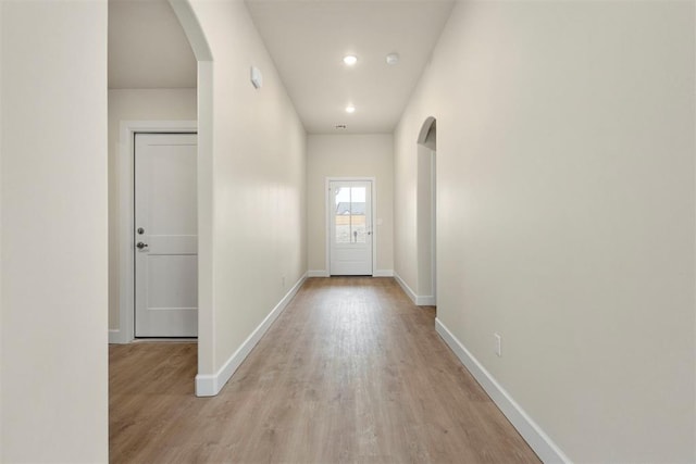 1208 Ariana St, Shawnee, OK 74804 - corridor with arched walkways, light wood-style floors, baseboards, and recessed lighting