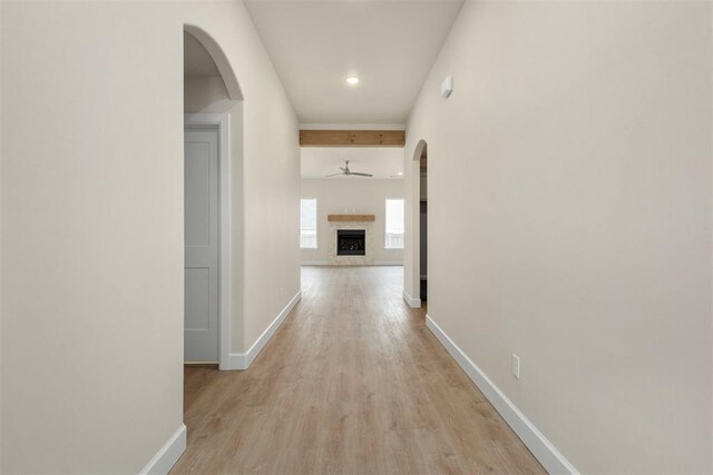 1208 Ariana St, Shawnee, OK 74804 - hall featuring arched walkways, light wood-type flooring, baseboards, and recessed lighting