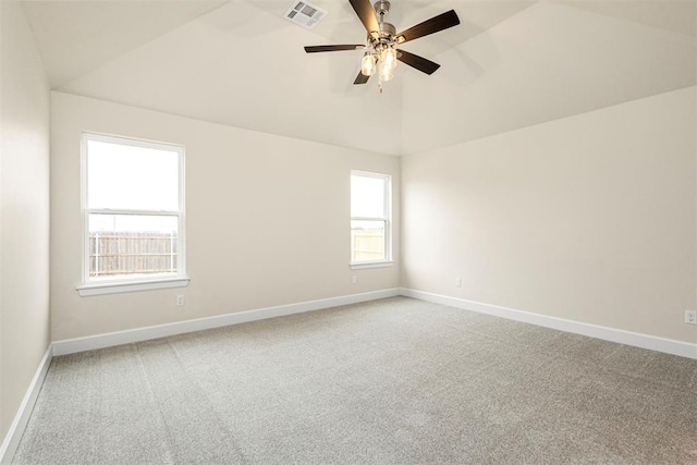 1208 Ariana St, Shawnee, OK 74804 - carpeted spare room with lofted ceiling, ceiling fan, and baseboards