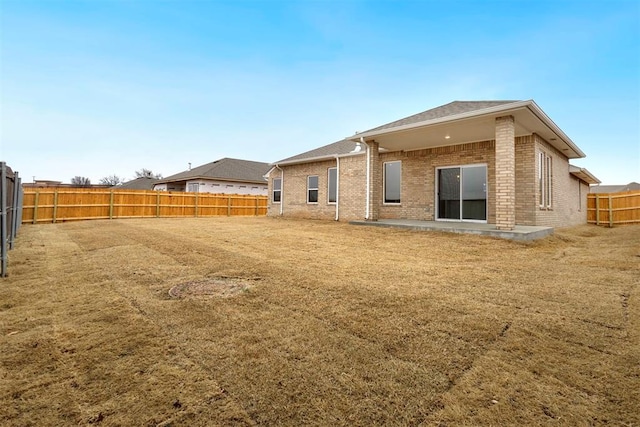 1208 Ariana St, Shawnee, OK 74804 - back of house with brick siding