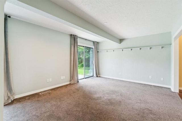 4208 Briarcrest St, Norman, OK 73072 - carpeted spare room featuring baseboards and a textured ceiling