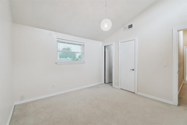 4208 Briarcrest St, Norman, OK 73072 - unfurnished bedroom featuring light carpet and lofted ceiling