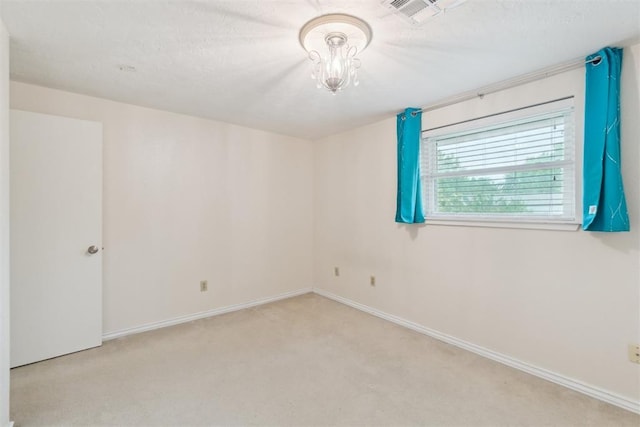 4208 Briarcrest St, Norman, OK 73072 - carpeted empty room featuring a chandelier and baseboards