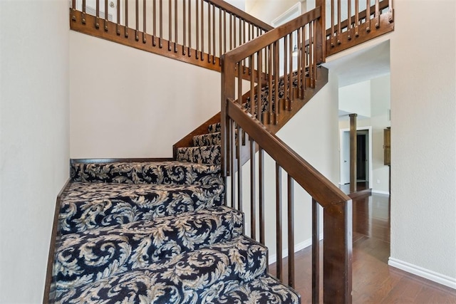 4208 Briarcrest St, Norman, OK 73072 - stairway with wood finished floors and a high ceiling