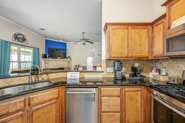 2365 Turtlewood River Rd, Midwest City, OK 73130 - kitchen with appliances with stainless steel finishes, a sink, backsplash, ornamental molding, and ceiling fan