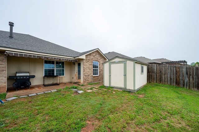 2365 Turtlewood River Rd, Midwest City, OK 73130 - back of house featuring brick siding and roof with shingles