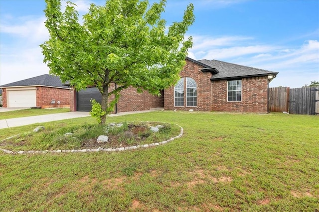 2309 NW 157th Ter, Edmond, OK 73013 - view of front facade featuring brick siding, driveway, an attached garage, and a shingled roof