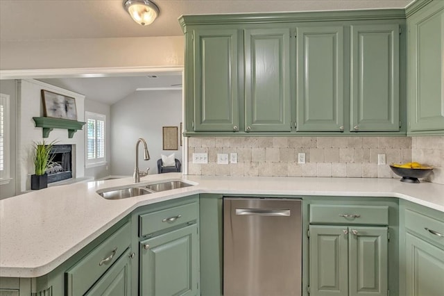 2309 NW 157th Ter, Edmond, OK 73013 - kitchen featuring green cabinetry, dishwasher, a sink, lofted ceiling, and a peninsula