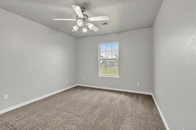 2309 NW 157th Ter, Edmond, OK 73013 - carpeted empty room featuring baseboards and a ceiling fan