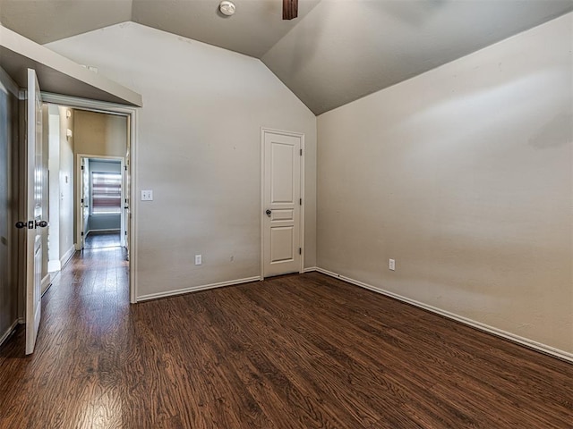 4305 NW 164th Ter, Edmond, OK 73013 - spare room with dark wood-style flooring, vaulted ceiling, and baseboards