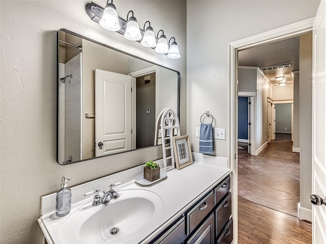 4305 NW 164th Ter, Edmond, OK 73013 - bathroom with vanity and wood finished floors